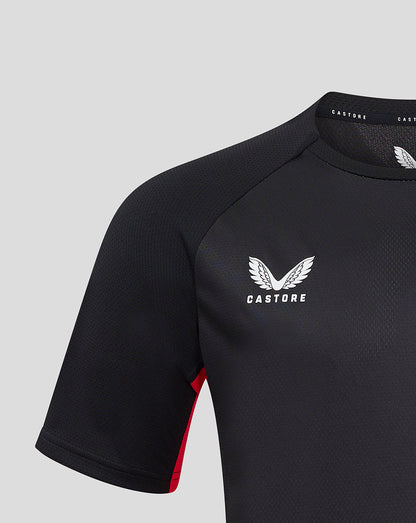 Castore logo and wing emblem on left chest of dark Saracens jersey