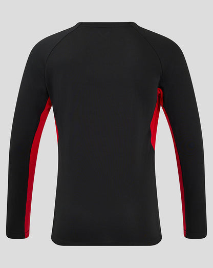 Back view of black Saracens matchday long sleeve tee with red side panels and dropped hem.