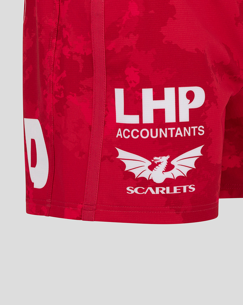 Back view close up of Scarlets red shorts showing CK Foodstores logo across the seat and dragon emblem