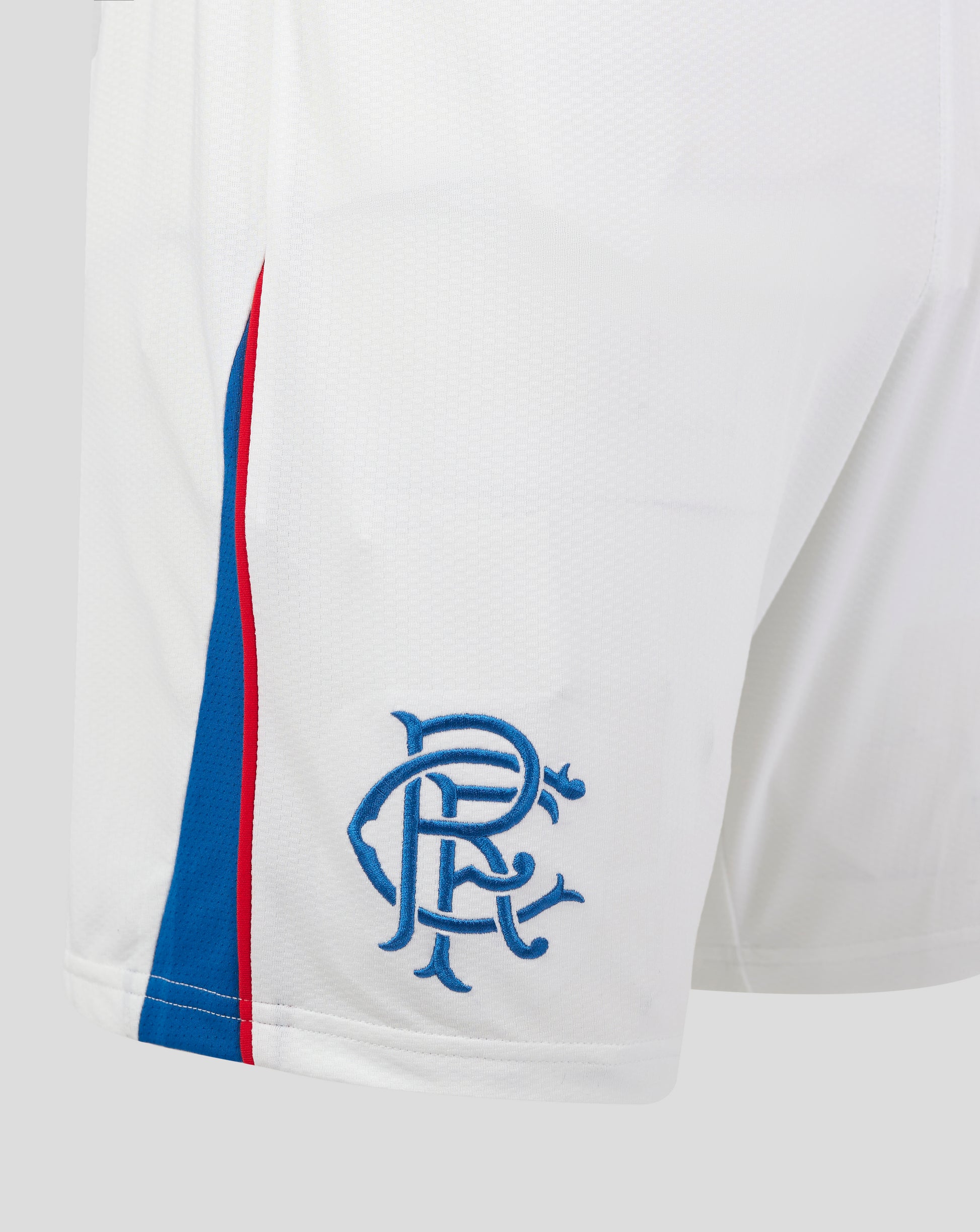 White Rangers Home Shorts close up with blue and red side stripe and crest on the right thigh