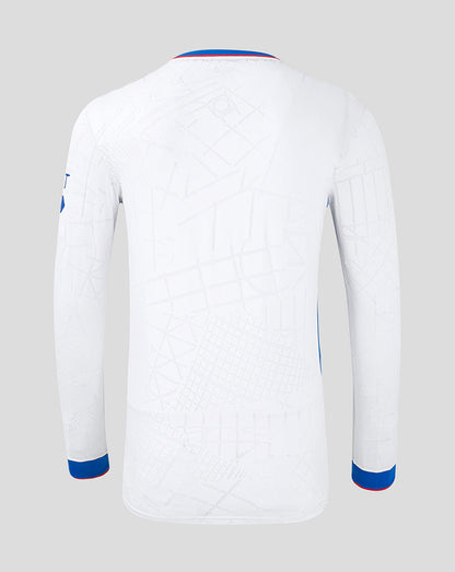 Back view of white Rangers away long sleeve shirt with geometric pattern blue red collar trim and left chest crest
