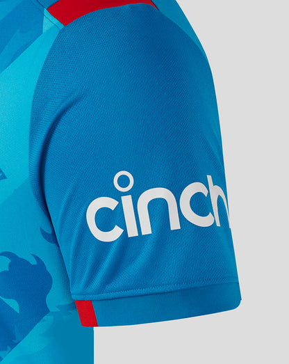 Sleeve close up of blue England ODI shirt with cinch logo near the cuff.