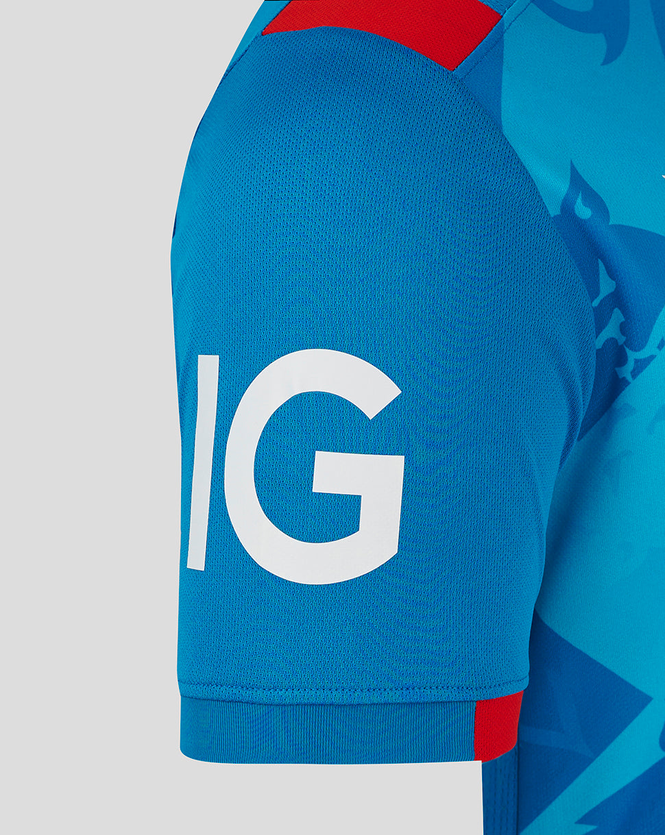 Close-up of blue England ODI shirt sleeve with white branding on the cuff