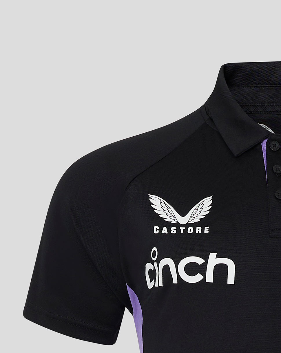 Front view of black England polo featuring Castore logo and cinch sponsor on the chest with purple side panel
