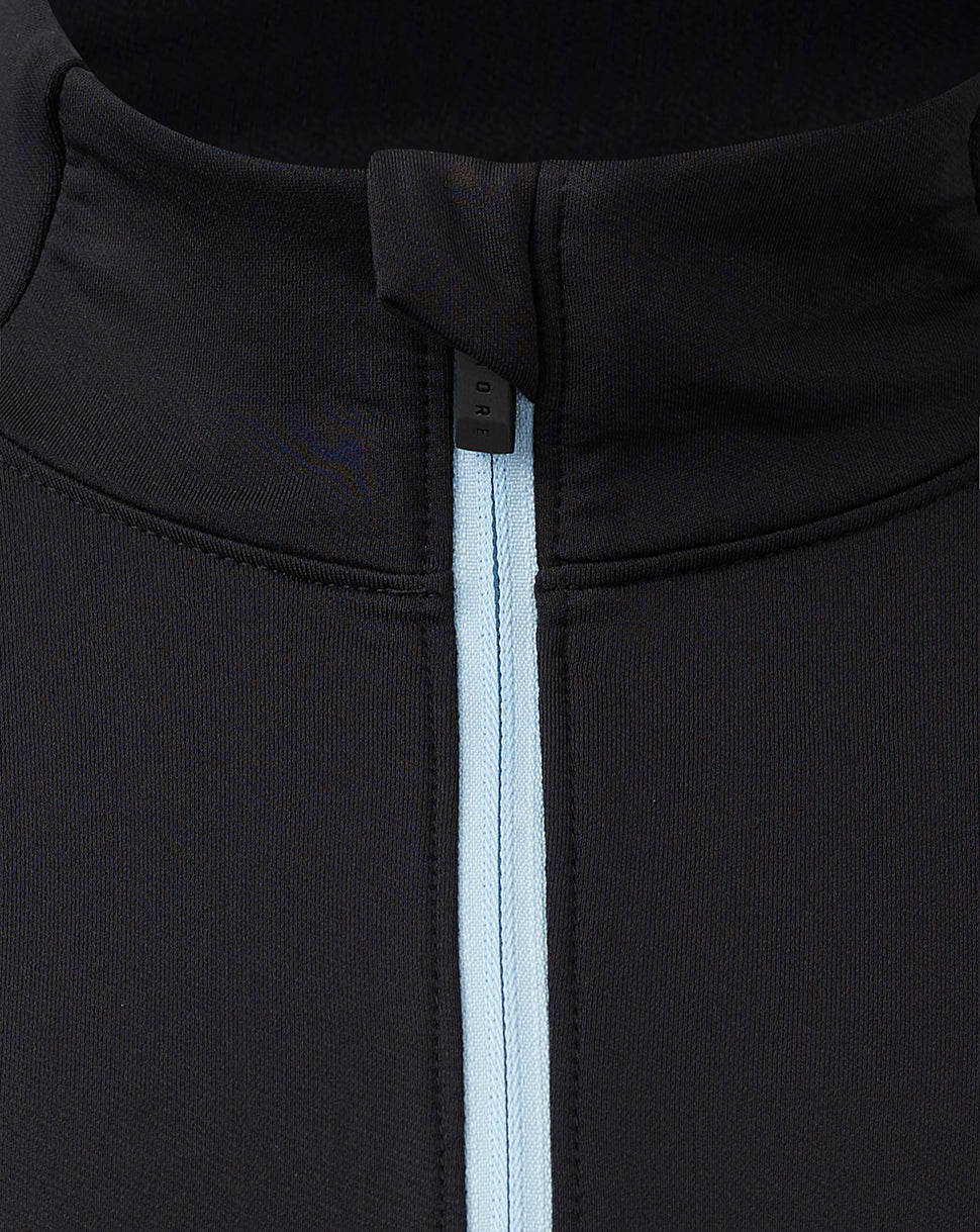 Close-up of the neck area with a light blue zipper tape on a black Rangers Pro Coaches top