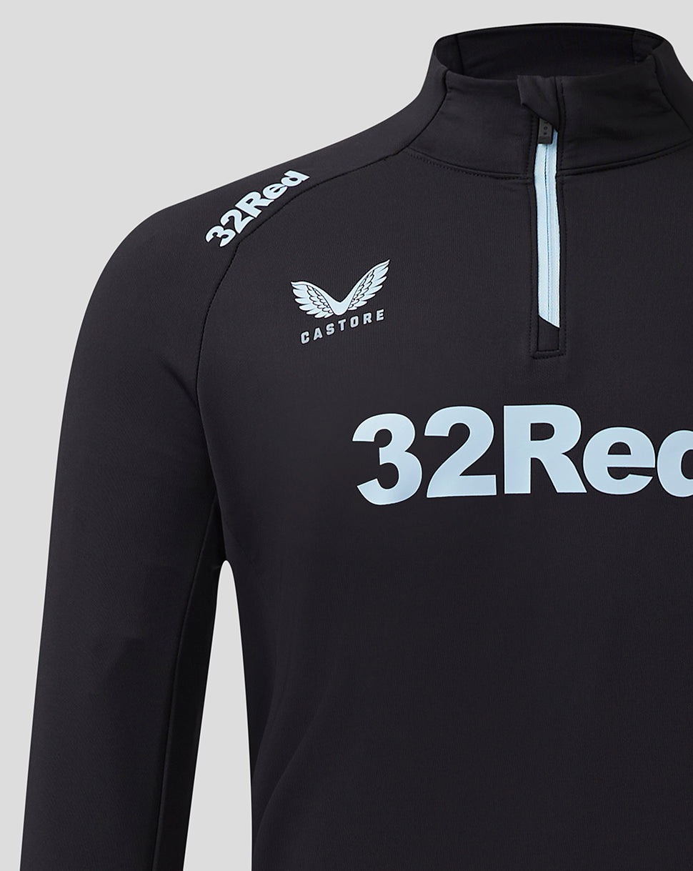 Close up of left chest area showing club crest and large light blue 32Red logo on black Rangers Pro Coaches top.