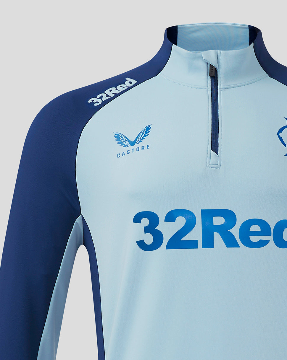 Shoulder and chest view of Rangers training top with 32Red sponsor on the shoulder and Castore branding on the chest