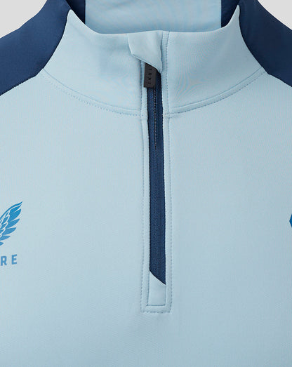 Close up of the upper chest and collar of the Rangers training top with a zip and visible club crest