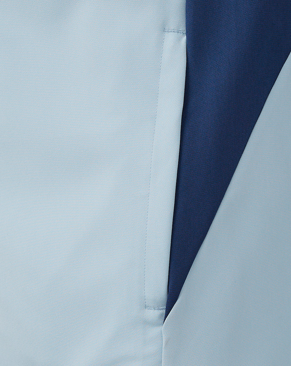 Close-up of a two-tone Rangers Pro Players jacket with a light blue front panel and navy side panel and sleeve.