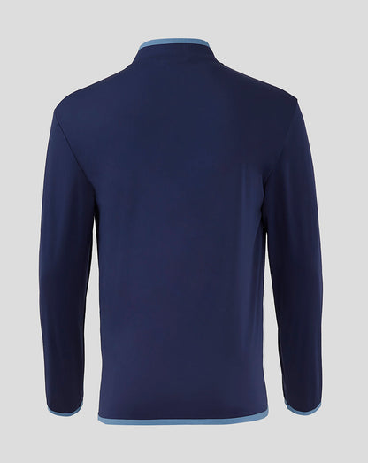 Rear view of navy Rangers Travel Softshell Jacket with light blue trim at the hem and collar.