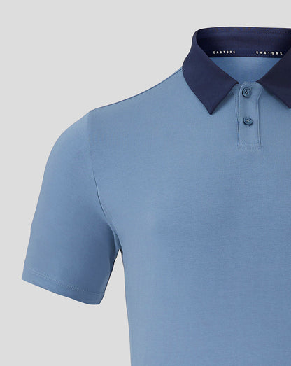 Front view of light blue Rangers travel polo with navy foldover collar and Castore branding along inner neck