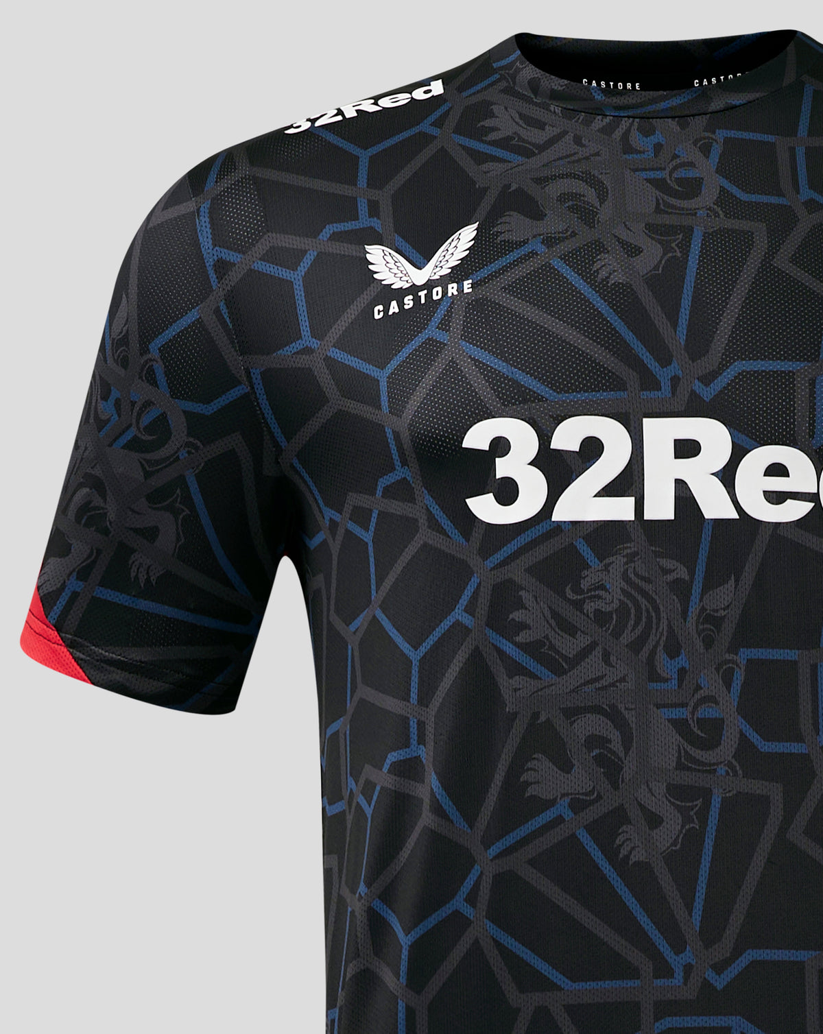 Shoulder and chest view of Rangers Third Matchday T Shirt with crest and subtle geometric pattern in dark tones.
