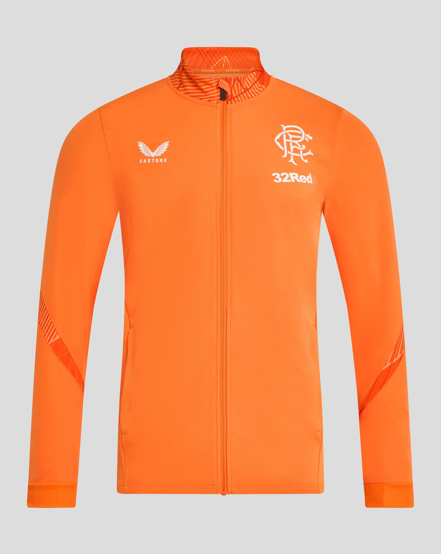 Bright orange Rangers league matchday anthem jacket with Castore logo and club crest and 32Red branding on the chest.