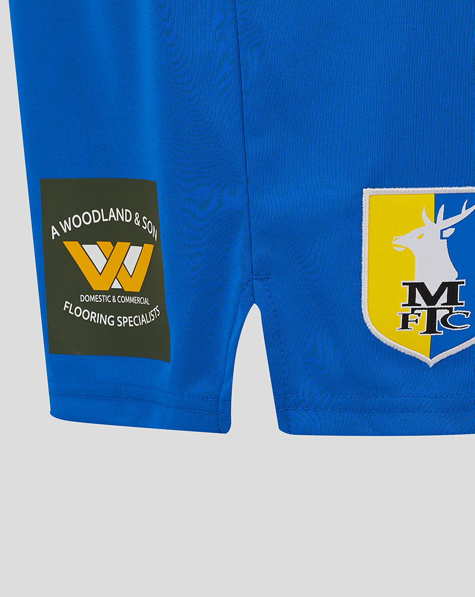 Blue Mansfield Home Shorts showing A Woodland & Son patch on left leg and crest shield on right leg