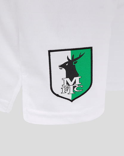 Close up of Mansfield shield crest on left leg of white shorts
