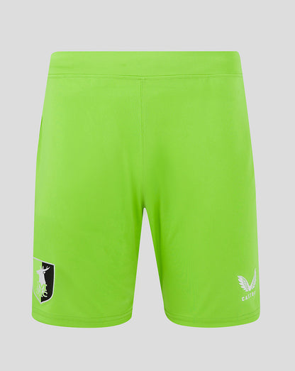 Back view of bright green Mansfield Away goalkeeper shorts with two-color crest on right thigh and Castore branding on left thigh.