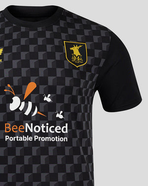 Mansfield Third Shirt close-up showing crest on left chest and BeeNoticed print on front
