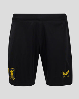 Mansfield Men's 24/25 Third Shorts in black with flat front waistband and internal elastic, side seam split; yellow shield crest on left thigh and Castore branding on right thigh.