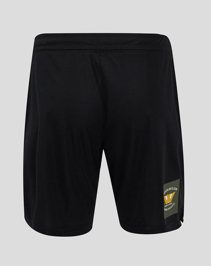 Back view of black Mansfield Third Shorts with a logo patch on the lower right leg.