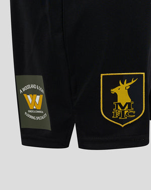 Back view of Mansfield Men's 24/25 Third Shorts in black with A Woodland and Son patch on left leg and yellow MFC crest on right leg.
