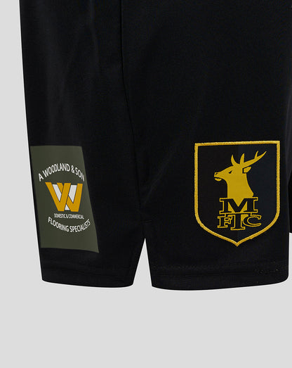 Back view of Mansfield Men's 24/25 Third Shorts in black with A Woodland and Son patch on left leg and yellow MFC crest on right leg.