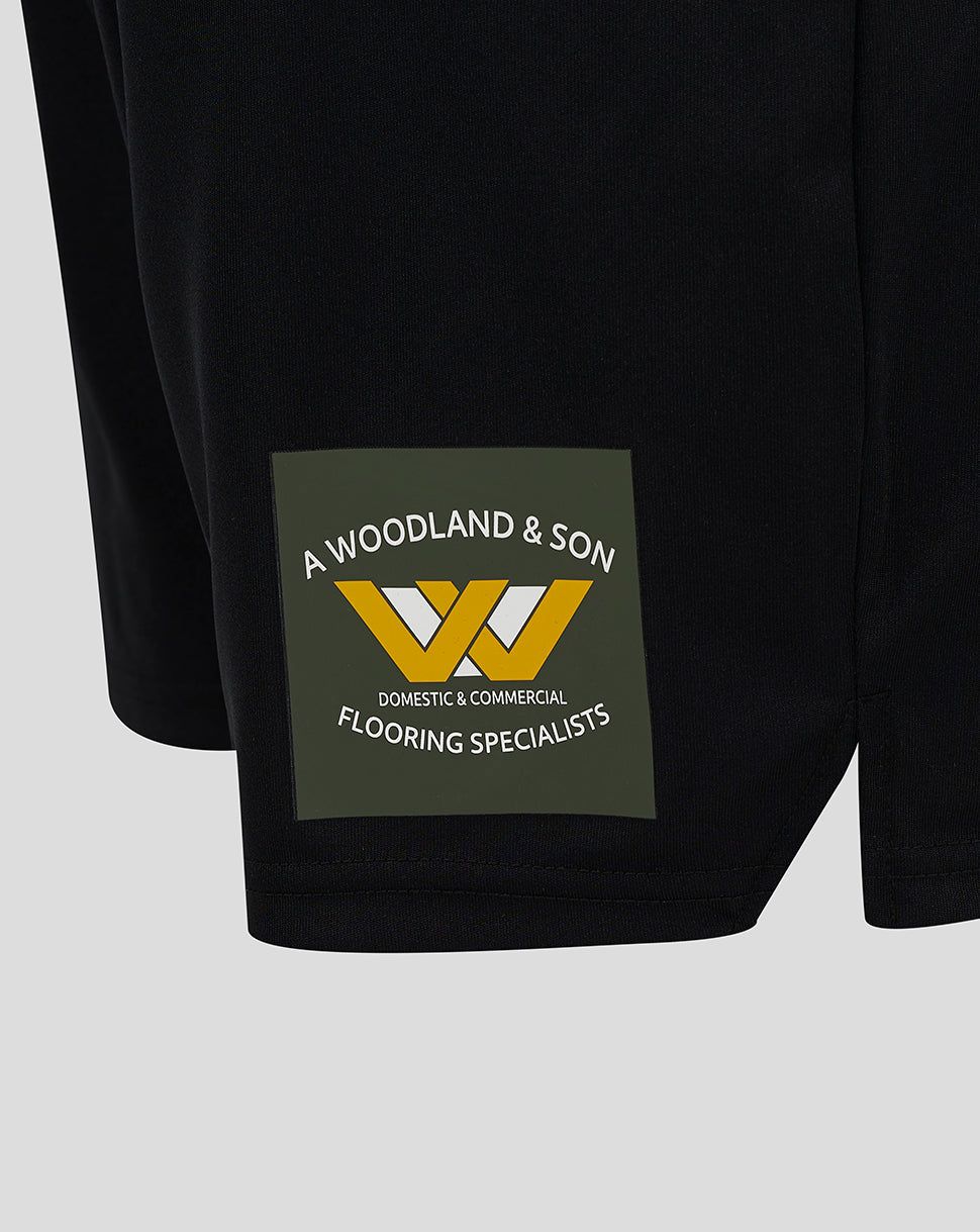 Side view of Mansfield Third Shorts showing a logo patch on the outer left leg.