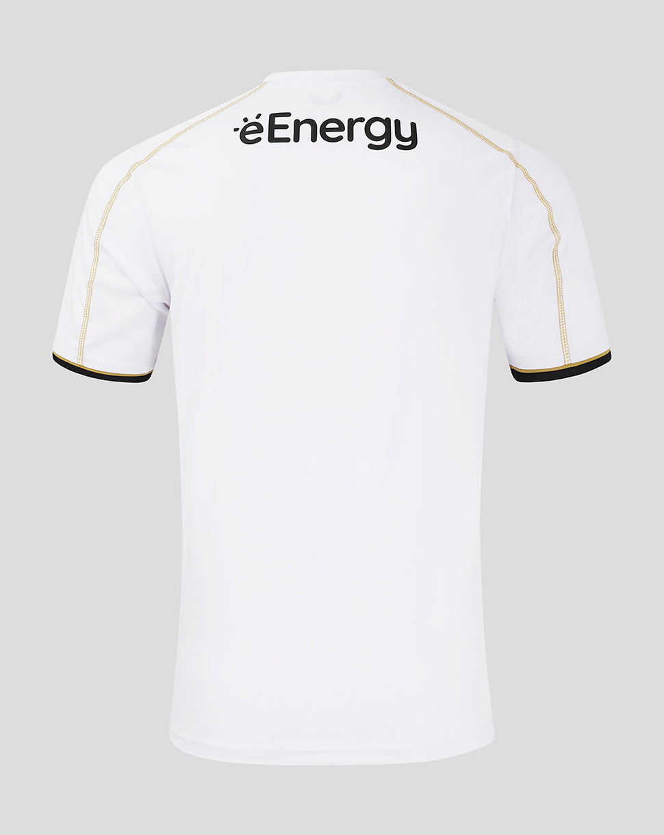 Back view of white MK Dons home shirt with gold piping along the shoulders and black cuff trim