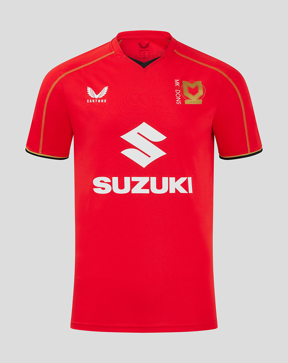 Mk Dons men's 24/25 away shirt in red with large Suzuki sponsor, Castore logo on left chest and gold club crest on right chest.