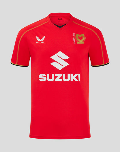 Mk Dons men's 24/25 away shirt in red with large Suzuki sponsor, Castore logo on left chest and gold club crest on right chest.