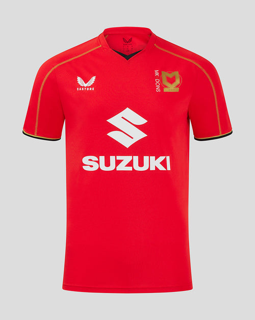 Mk Dons men's 24/25 away shirt in red with large Suzuki sponsor, Castore logo on left chest and gold club crest on right chest.