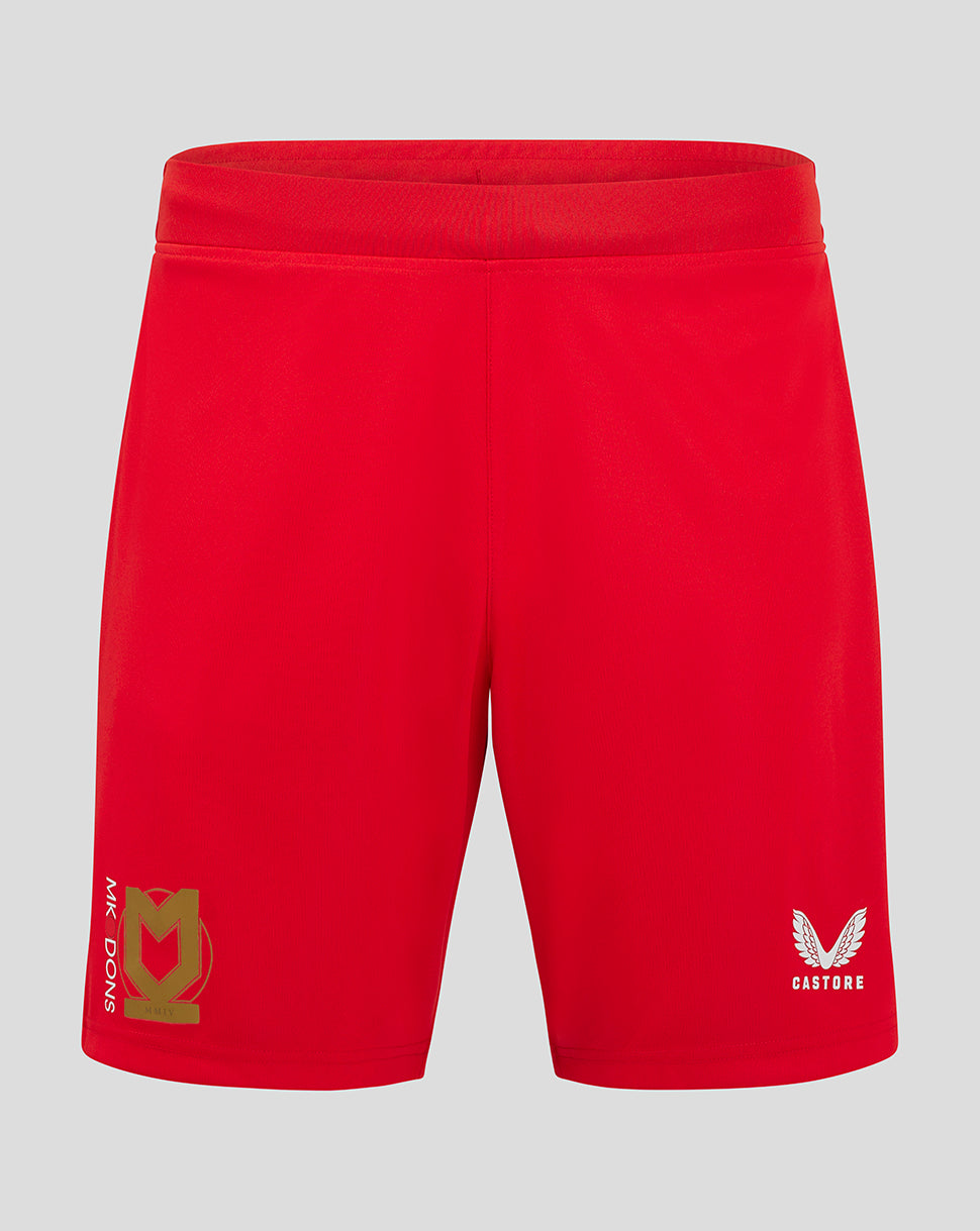 Red Mk Dons away shorts with gold crest on left leg and Castore logo on right leg.