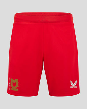 Red Mk Dons away shorts with gold crest on left leg and Castore logo on right leg.