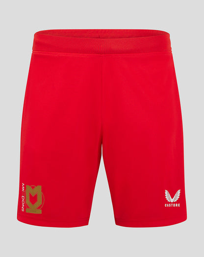Red Mk Dons away shorts with gold crest on left leg and Castore logo on right leg.