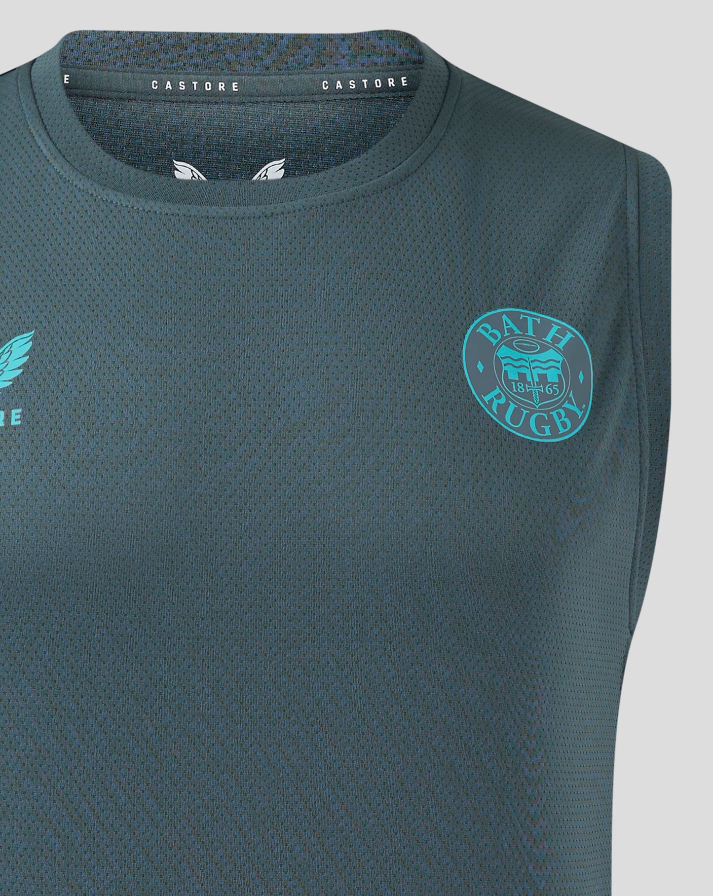 Front view of Bath Rugby training vest in teal with left chest club crest and right chest Castore branding