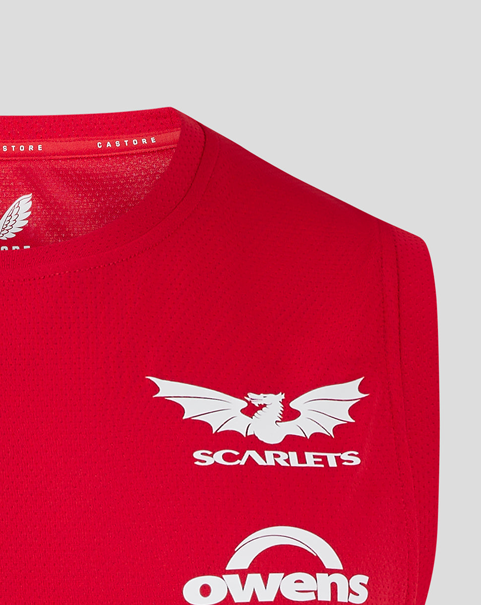 Close-up of red Scarlets training vest with large white Scarlets dragon logo on the chest and Owens logo visible nearby.