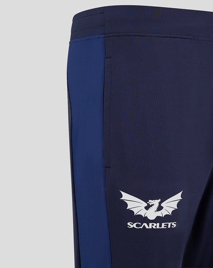 Scarlets navy training pant close up showing light blue side panel and white dragon logo.
