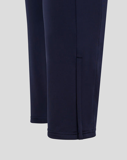 Lower leg close up of Scarlets training pant featuring dark navy fabric and visible hem stitching.