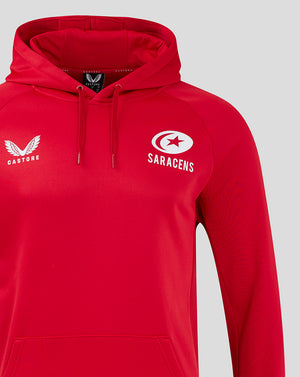 Front view of red Saracens training hoody with white Castore wing logo on the left chest and Saracens emblem on the right.