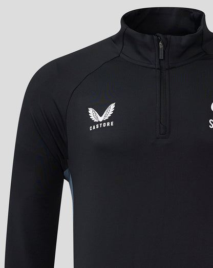 Front view of black training top with quarter zip and Castore wing logo on the chest.