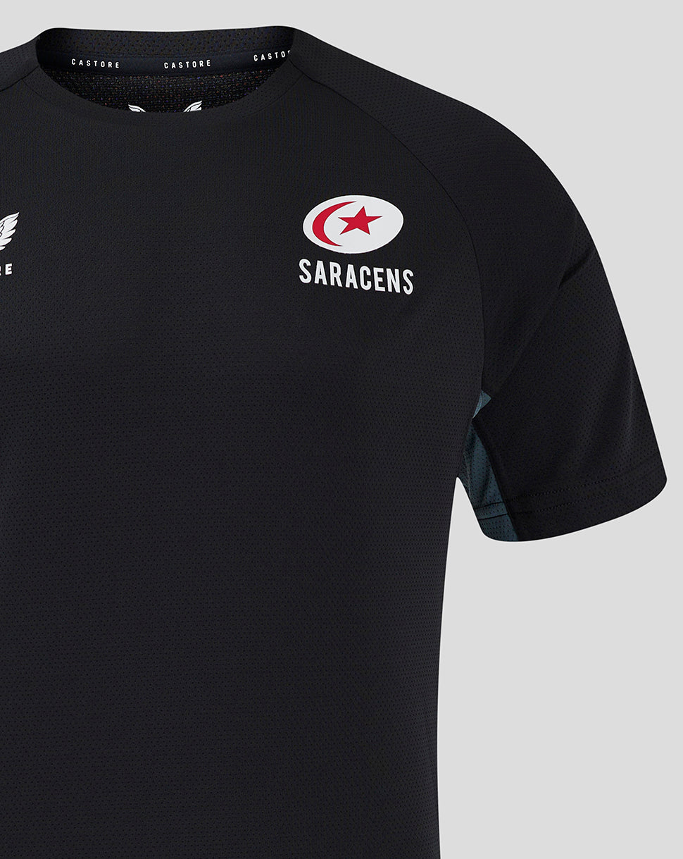 Close up of black Saracens training tee chest area showing the Saracens crest logo