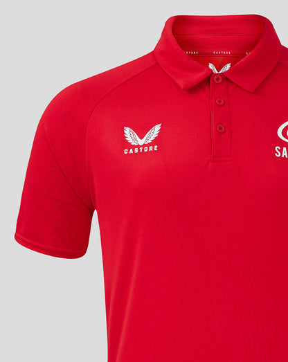 Close-up of a red polo shoulder with the Castore logo and Saracens branding on the chest.