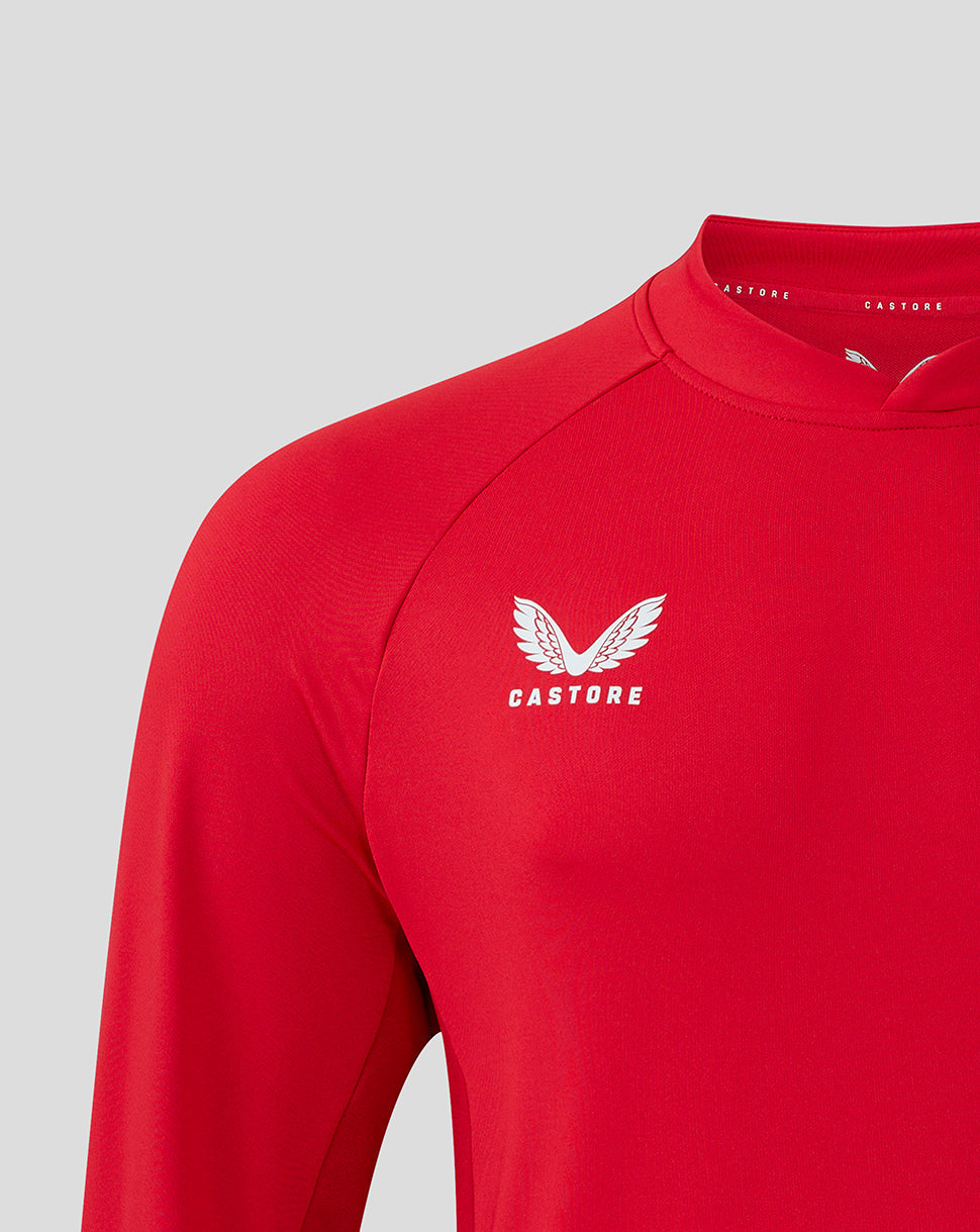 White Castore logo on red Saracens training midlayer chest