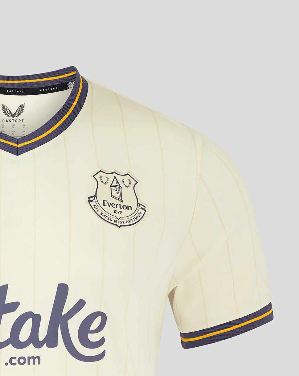 Everton crest on cream 24/25 third shirt with purple and yellow trimmed collar