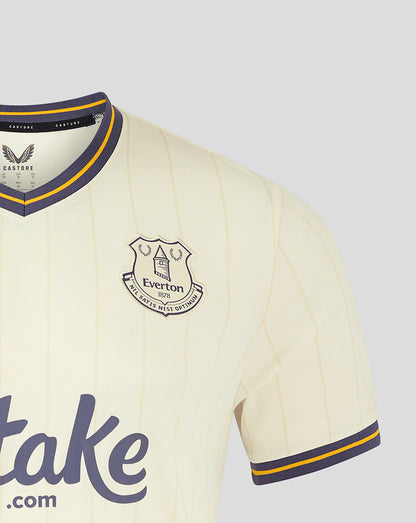 Everton crest on cream 24/25 third shirt with purple and yellow trimmed collar