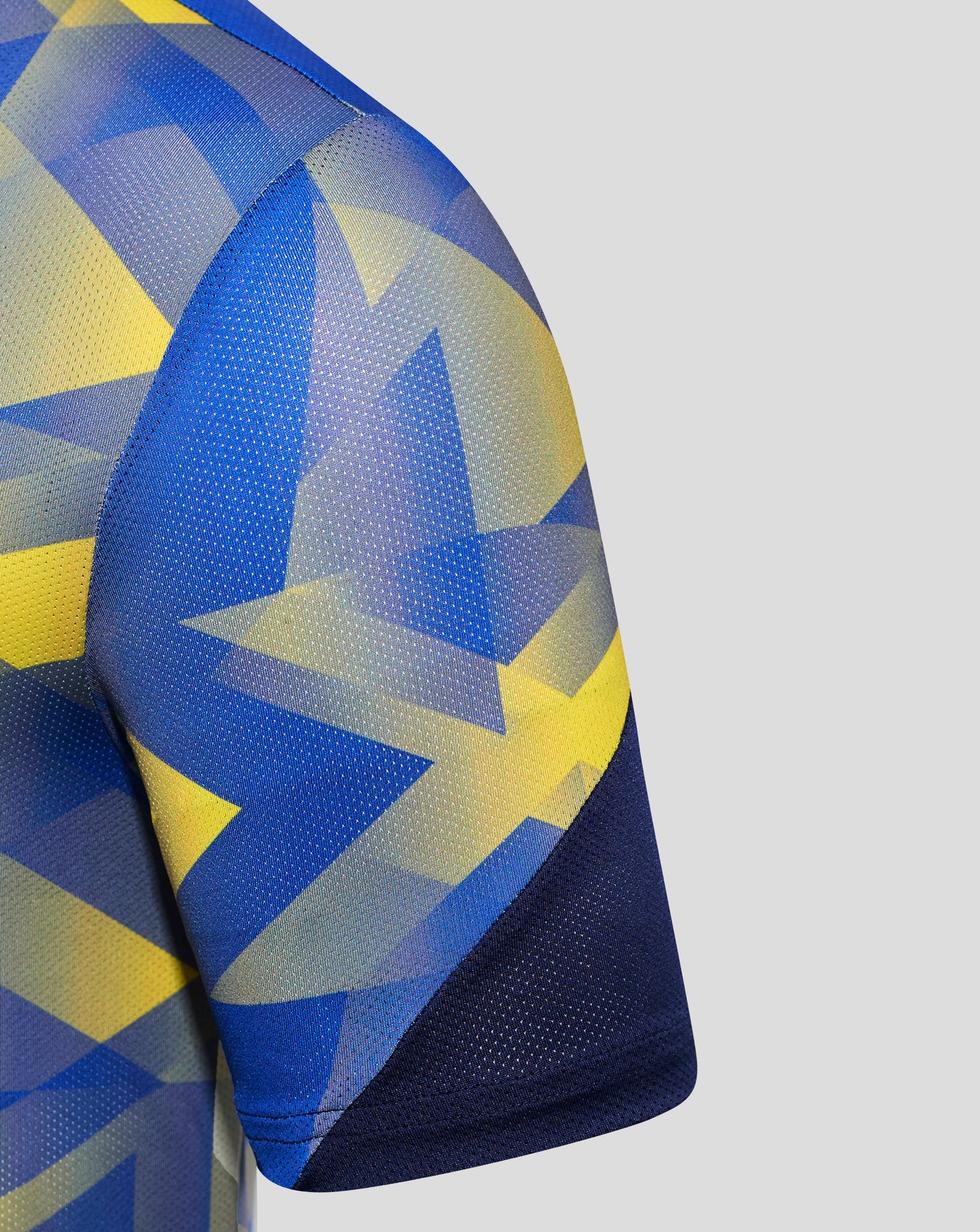Close up of sleeve and shoulder on Everton 24/25 Third Matchday T Shirt showing blue yellow geometric print