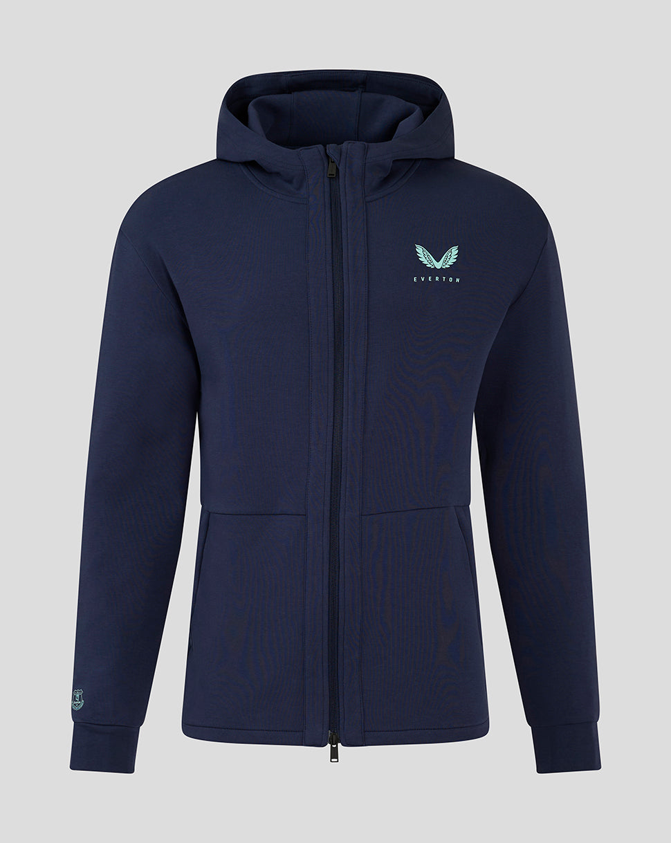 Navy blue men's hooded travel jacket with full front zipper and turquoise wing logo on the chest.