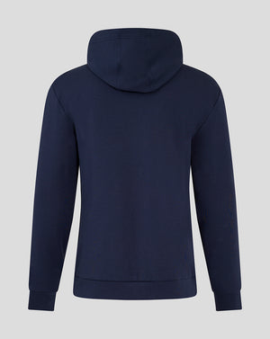 Rear view of navy blue hooded travel jacket showing an attached hood and smooth back.