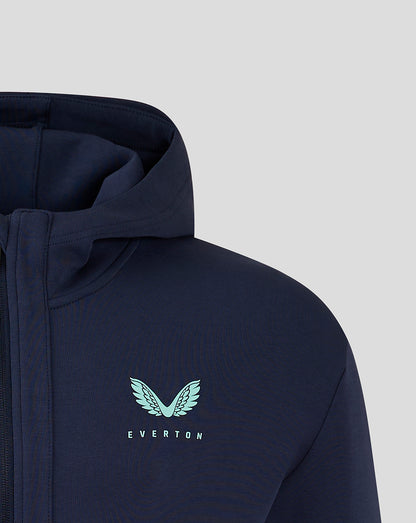 Navy jacket chest with pale blue Everton crest and logo text