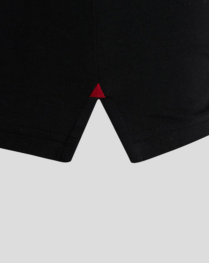 Close-up of black Rangers T shirt hem with a small red triangle detail at the center
