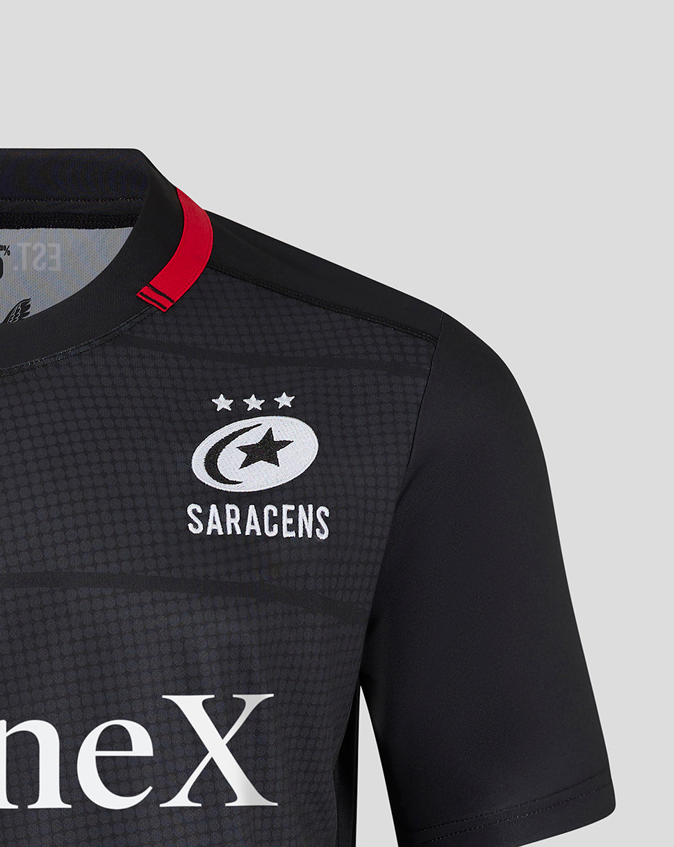 Saracens home replica jersey close up showing left chest club crest and bold sponsor lettering across the front.